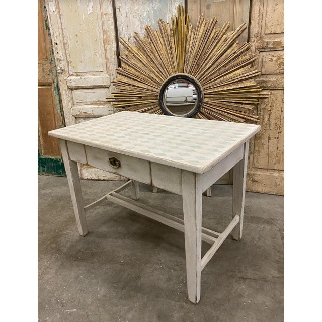 Charming French painted accent table , finished on all sides, with drawer. This lovely piece features a soft blue and...