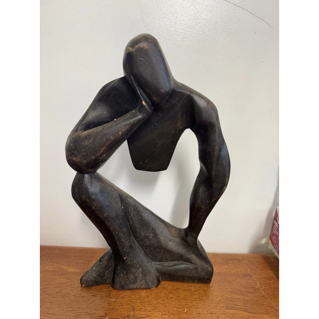 Vintage abstract “thinking man” sculpture with a modernist, minimalist form and dark black/brown finish. Displays well as...