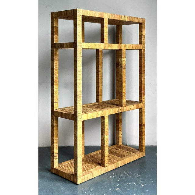 Infuse your home with relaxed elegance with this vintage Coastal wrapped rattan etagere. This stunning piece beautifully...