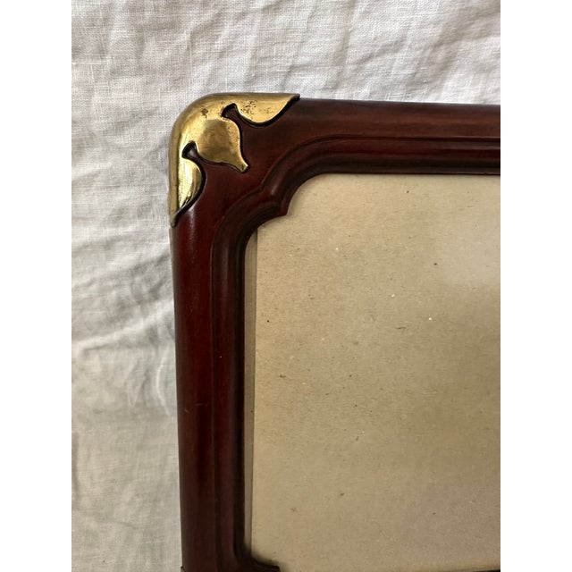Vintage Wood & Brass Picture Frame Perfect for an office or bookcase. Dark wood with brass accents on the corners. You can...