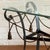 1960s style metal framed console table with gilt rope and tassel detailing. Measurements H: 65cm L: 115cm W: 45cm...
