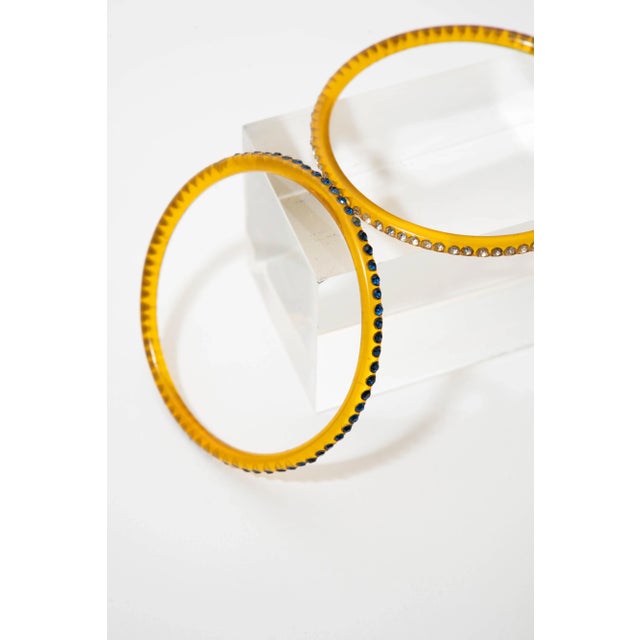 Vintage Trio of 3 Amber Colored Celluloid Bangle Bracelets With Colored Rhinestones 30's For Sale - Image 4 of 6