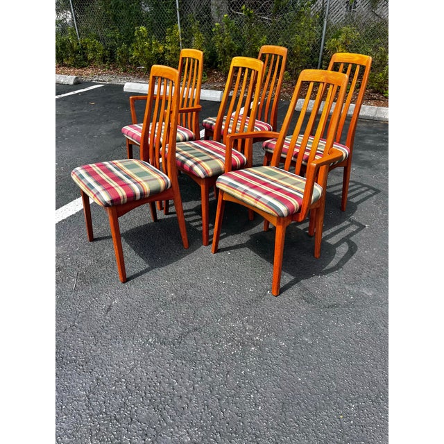 Mid-century modern dining chairs in Benny Linden style set of six with armchairs. Two armchairs with four side chairs....