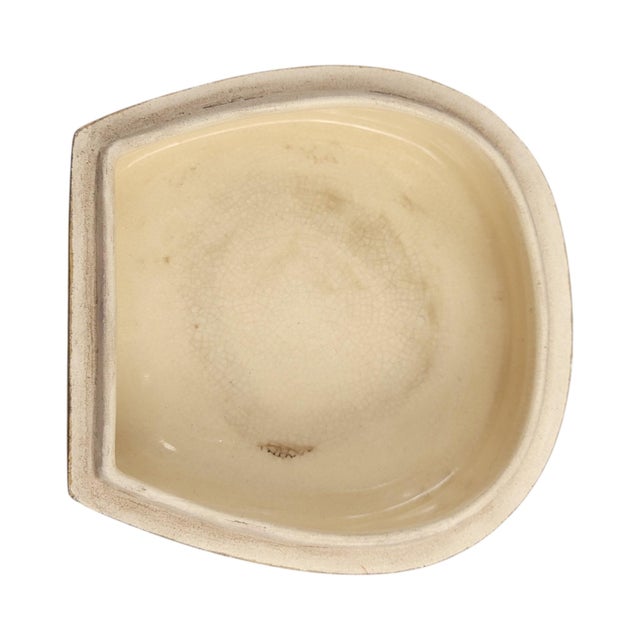 An exceptional Japanese Satsuma earthenware box and cover from the Meiji period, distinguished by its substantial weight,...