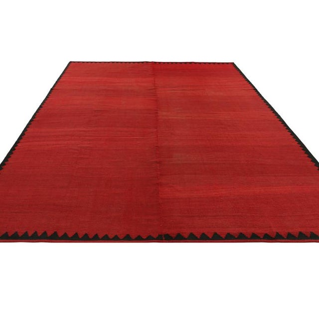 Handwoven in a wool flatweave, originating circa 1950-1960, this 9x10 vintage Turkish kilim is an excellent example of the...