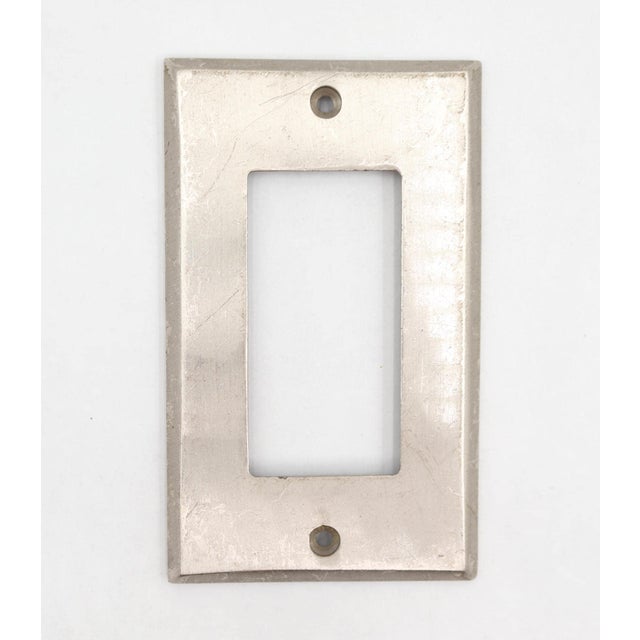 Reclaimed brushed nickel finished brass rectangular light switch covers. One is a single gang and the other is a four...