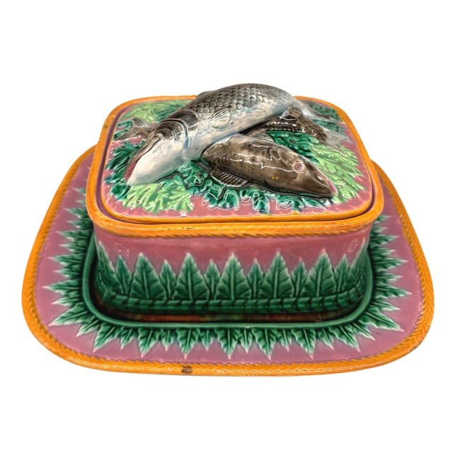 George Jones Majolica Sardine box on a pink ground, English, ca. 1870, the box molded with green acanthus leaves on a pink...