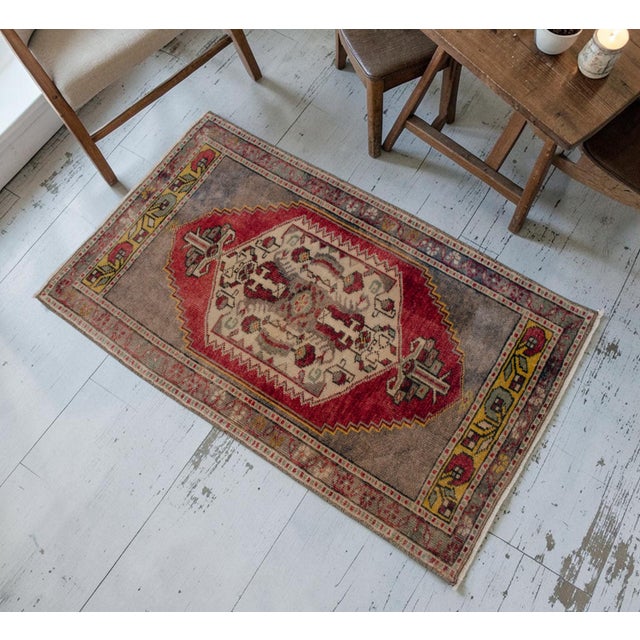 This charming vintage Oushak rug brings authentic Anatolian character to any intimate space in your home. Expertly hand-...