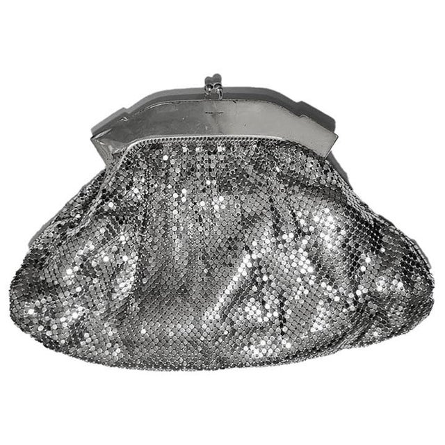 Vintage Whiting & Davis sparkly silver-tone clutch purse with large rhinestones surrounding the top of the frame. The...