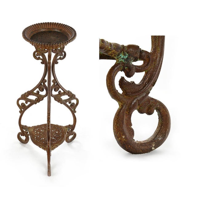 Patinated Cast Iron Bolster, in Very Good conditions. This piece is designed in the style of the selected designer and/or...