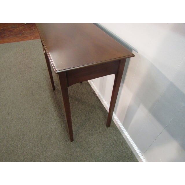 Item: Kittinger Colonial Williamsburg solid mahogany console style table. Age: 1980's. Details: Chippendale style and a...