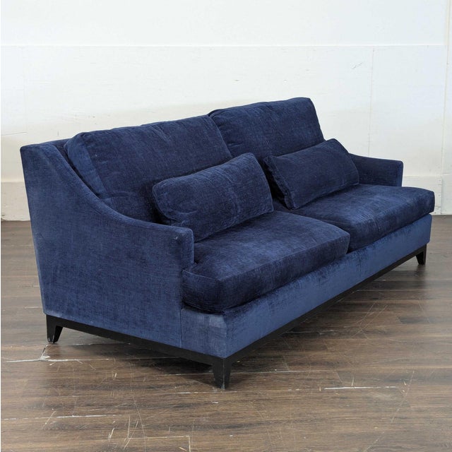 This 3-seat sofa custom made sofa by The Jones in Los Angeles offers plenty of seating and comfort with its deep blue...