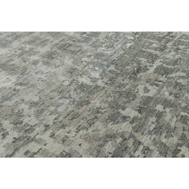 Hand-knotted in silk, this contemporary 9x12 abstract rug is a new addition to Modern Collection | Rug & Kilim. On the...