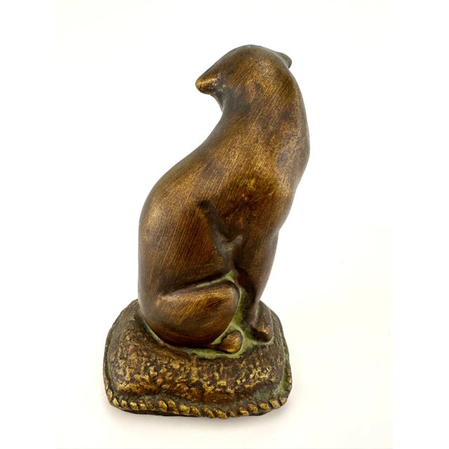Introducing our captivating Vintage 1960's Mid Century Bronze Color Cat, a sleek and stylish addition to your modern...