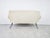 Striking Mid-Century two seater sofa. It has been reupholstered in white and pink fabric. Typical and elegant 1950s...