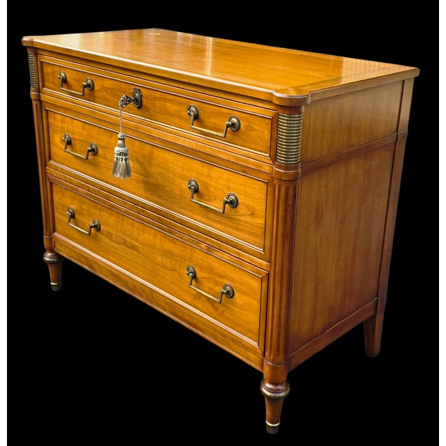 This Vintage Kindel Furniture Belvedere Bachelor’s Chest is a classic piece with a lustrous wood finish and understated...