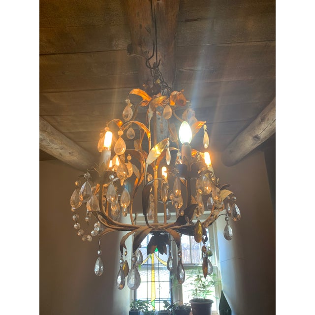 Beautiful and rare antique bronze chandelier with five arms, featuring ornate Baroque styling and detailed gilt leaf...
