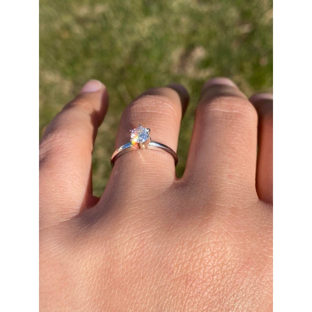 The Trafford: White Gold Solitaire Engagement Ring with Natural Diamond. At the heart of this ring lies a stunning round...