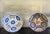 Large Spanish faience plates / shallow bowls, hand painted in the Catalonia region around 1900. This is a set of two.