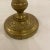 A Fine early 19th century French bronze candle stick holder with a reeded columnar standard, round base decorated with...