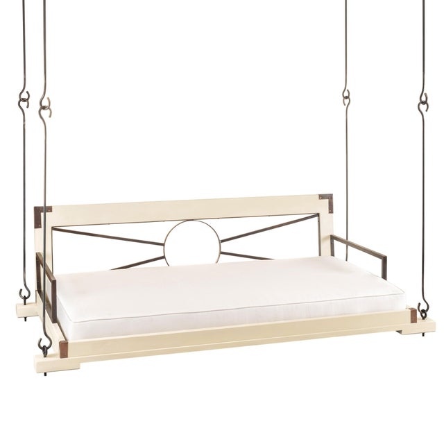 The XO Hanging Day bed with Metal back insert and metal arms to allow for a lighter look, perfect for any outdoor setting....