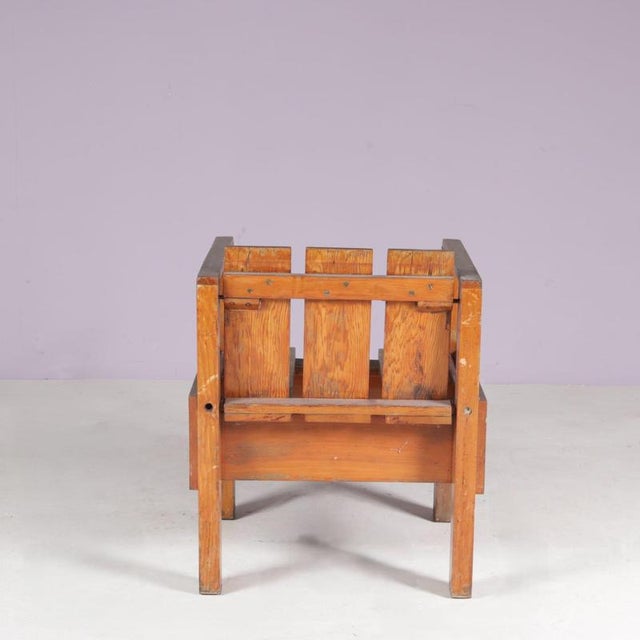 Crafted in the Netherlands during the 1960s, this teak wooden side chair is inspired by the iconic “Crate” furniture...