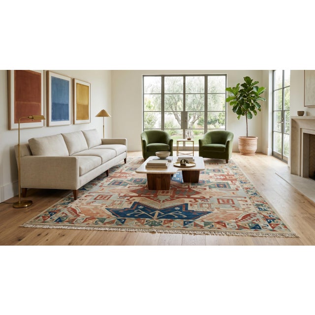 Transform your space with the bold elegance of this Modern Kazak-style wool rug. Inspired by Caucasian weaving traditions,...