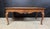 A lovely shaped Burr Walnut Coffee Table, having Queen Anne legs and nicely carved detailing. This example better quality...