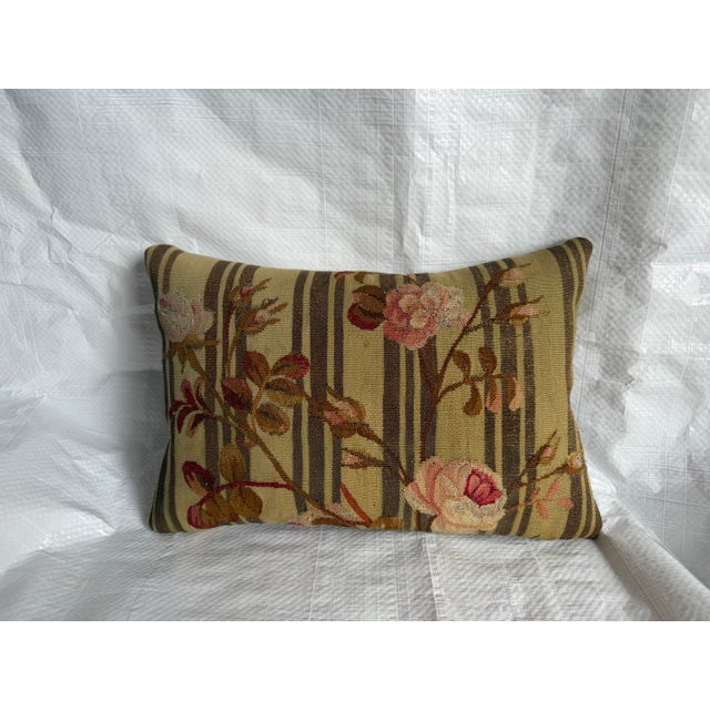 A refined decorative pillow handcrafted from an authentic mid-19th century French Aubusson tapestry fragment, beautifully...