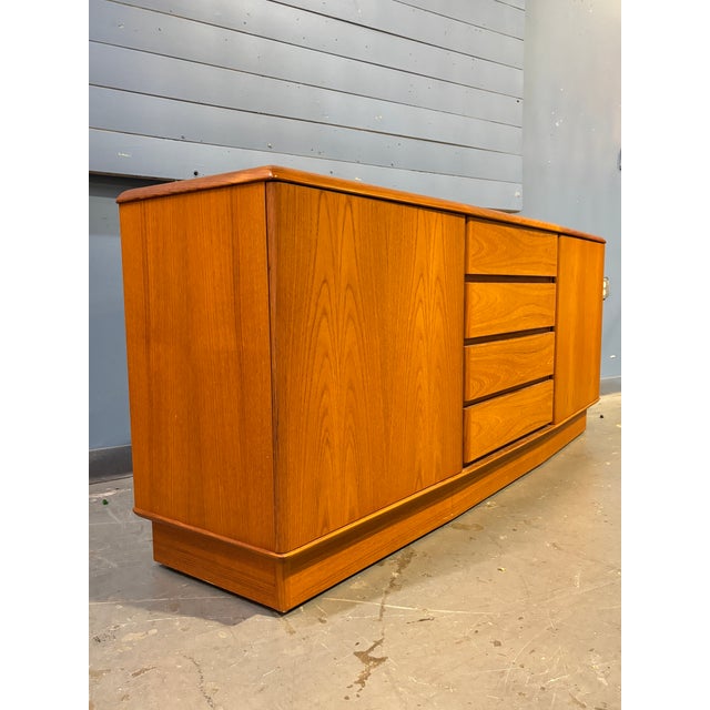 A great example of Danish modern, with simple design and a timeless look. The convex frame adds depth, there’s ample...