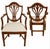 Substantial Baker dining table accompanied by ten coordinating dining chairs, including two armchairs and eight side...