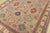 A tribal Caucasian Kazak rug hand-knotted with fine wool on a cotton foundation. This area rug features geometric motifs...
