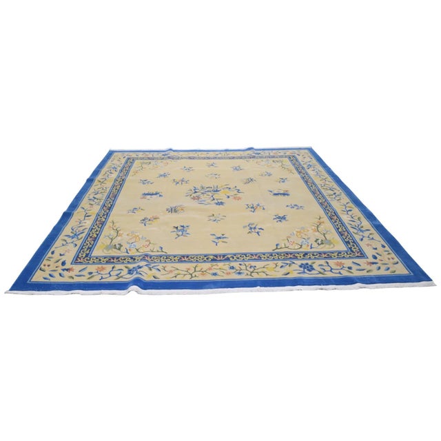 Hand-knotted with care using traditional rug-making techniques, this wool rug blends timeless craftsmanship with a modern...