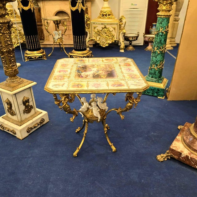 2010s French Style Coffee Table With Cherub Artwork, Bronze Accents For Sale - Image 5 of 8