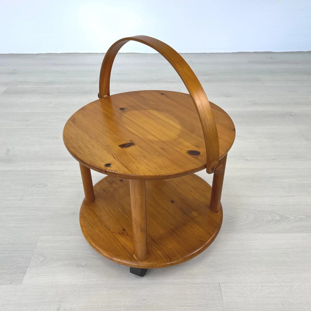Dimensions: H 16.5” x W 19.5” Danish pine rollable serving trolley from 1960s. Please see our other listings for ideas and...