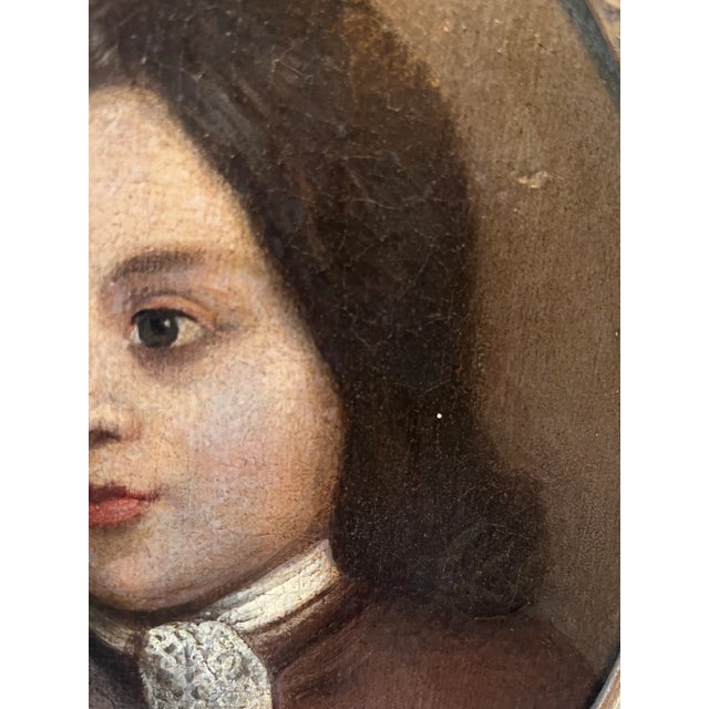 Precious oval oil on canvas painting of a boy in original frame Late 19THC