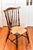 Nice early 20th century Brace Back Windsor side or dining chair with elegant turned legs and stretchers. The seat has...