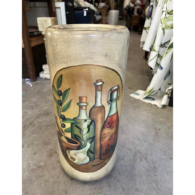 Up for consideration is a beautiful vintage large ceramic Mediterranean style umbrella stand with olive and wine accents....