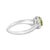 Adorn your hand with the splendor of rich, velvety green captured in a mesmerizing 6x6 mm peridot, its fiery hues deepened...