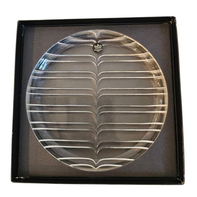 A pristine, unused pair of vintage 1980s handcrafted lead crystal plates from the "Arabesk" series, designed by the...