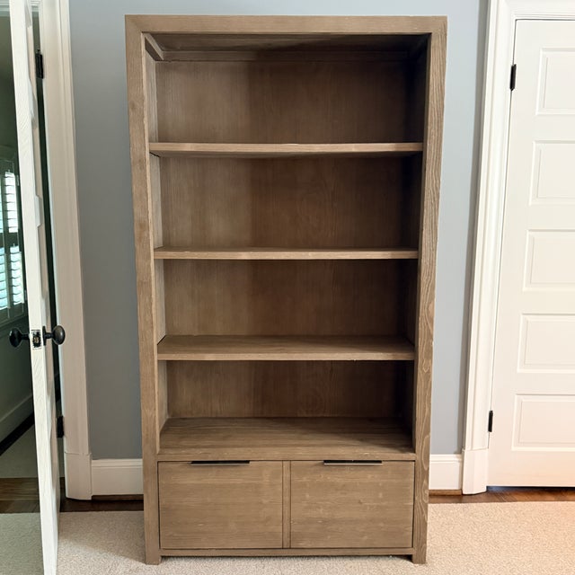 RH Laguna Bookshelf Coastal? Rustic? or just easy to place. Great storage, quality and condition! We have the dresser and...