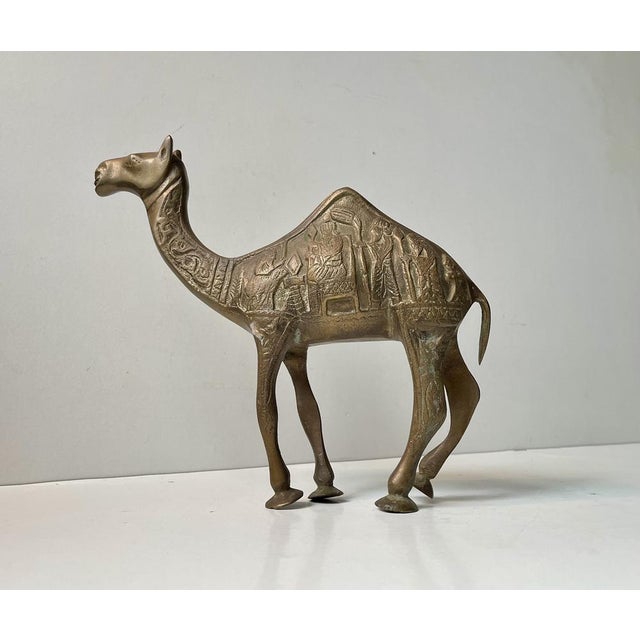 Curious old souvenir from Nord African, Israel or The Middle East. Large Camel/Dromedar figurine in hand-etched brass....