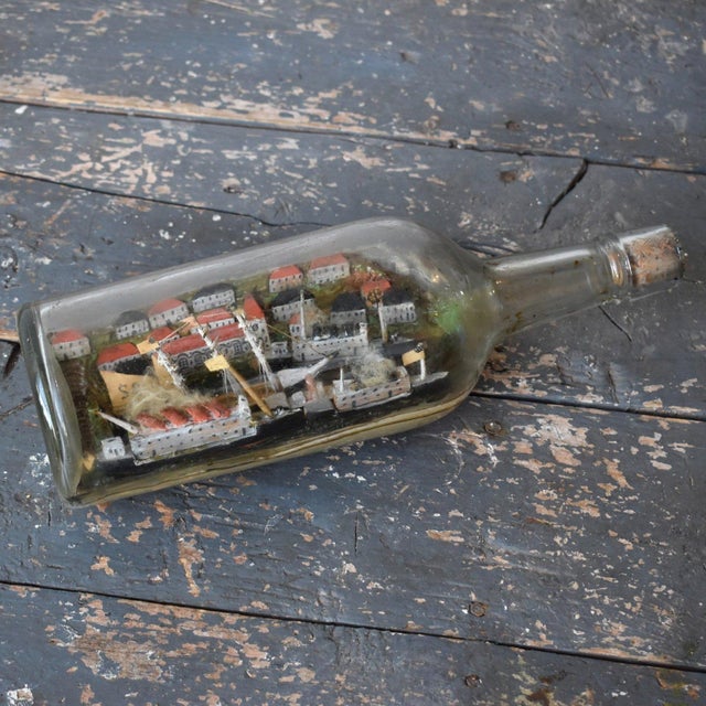 Vintage Folk Art Ship Diorama Bottle Whimsy, Circa 1940s. Housed in a one-quart glass liquor bottle with cork stopper,...