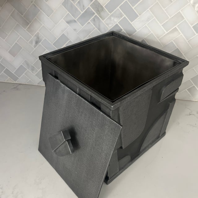 Heavy and handsome Jay Jeffers for Arteriors ice bucket. Features include top and removable metal liner. No longer in...