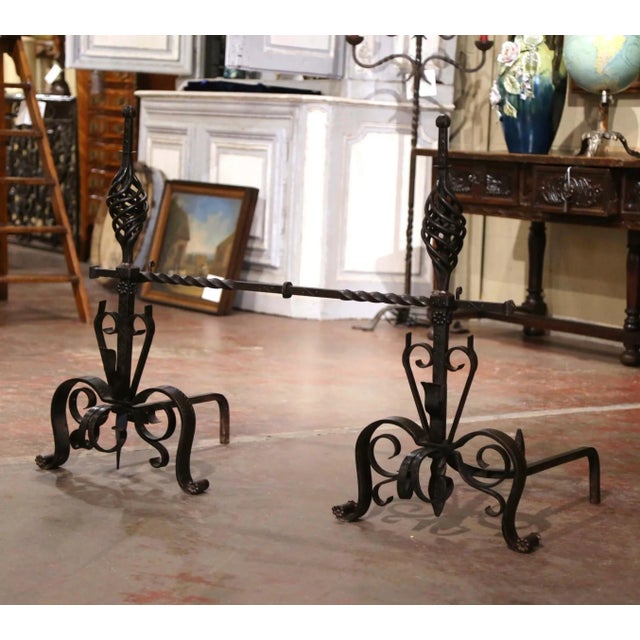 Decorate a fireplace with this three-piece set antique wrought iron andirons. Crafted in France, circa 1860, the fireplace...