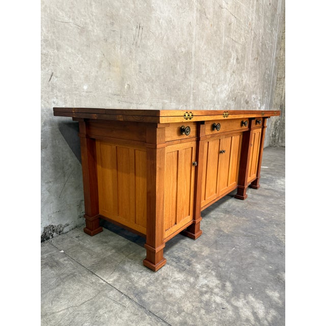 This extraordinary 1970s Arts and Crafts revival sideboard was custom-built by Brunner Cabinet Shop in San Francisco under...