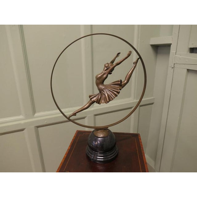 “La Danseuse” Bronze by Pierre Collinet, Ballerina Signed Bronze Art Deco Hoop Dancer after his fabulous model from the...