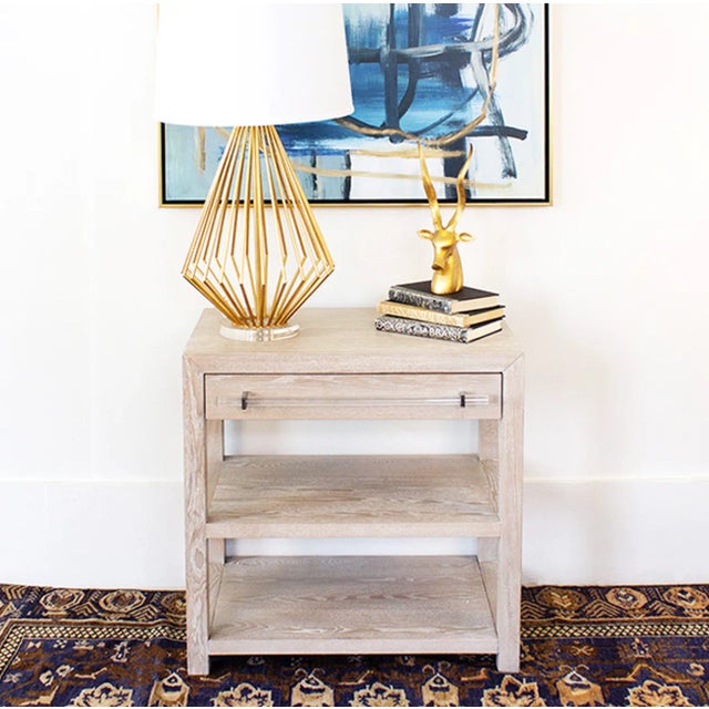Old world charm meets our modern lifestyle. Featuring a timeless light cerused oak finish and on-trend acrylic, nickel and...