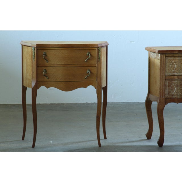 Pair of Danish oak nightstands from the 1970s, showing two different interpretations of traditional Scandinavian...