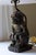 The lamp measures approximately 9.5” to the top of the monkey figure and 11” to the base of the light socket. Lamp base is...